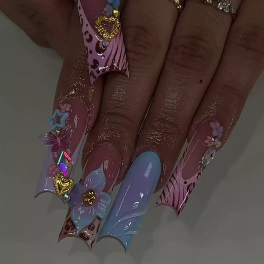 Hot-Selling Long Stiletto Press-On Nails with a Sweet & Cool Style, Blue Base, Cute Floral Design, and Gorgeous Crushed Rhinestone Star Accents