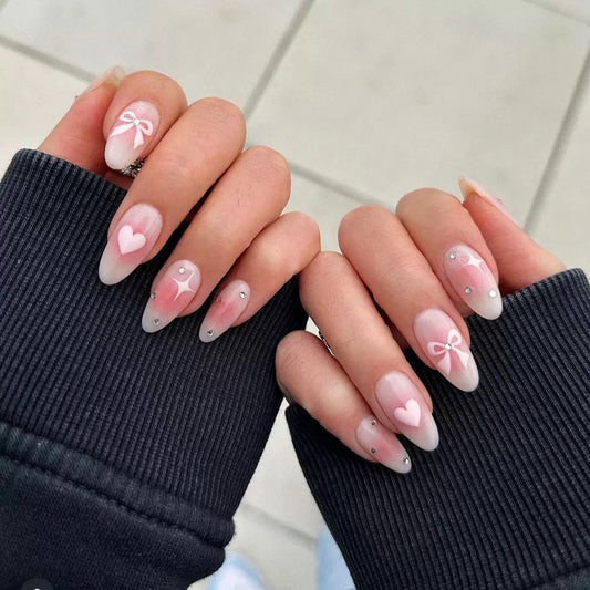 Valentine’s Day Simple Almond Press-On Nails with Heart, Bow, and Rhinestone Accents