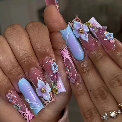 Hot-Selling Long Stiletto Press-On Nails with a Sweet & Cool Style, Blue Base, Cute Floral Design, and Gorgeous Crushed Rhinestone Star Accents