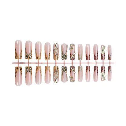 Best-Selling Long Tube Press-On Nails with Elaborate Bow, Gold Rhinestone Accents, and Leopard Print — Long Press-On Nail Set