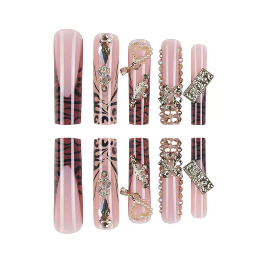 Elaborate Alloy Bow Press-On Nails with Gold Rhinestones, Leopard Print, and Long Tube Shape