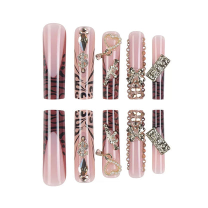 Elaborate Alloy Bow Press-On Nails with Gold Rhinestones, Leopard Print, and Long Tube Shape