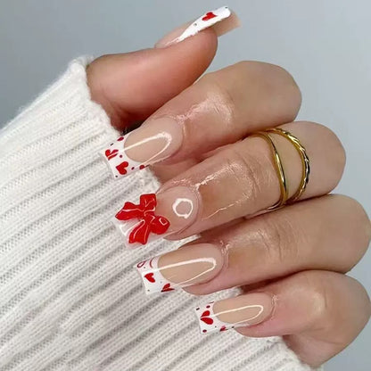Valentine’s Day Glossy White French Press-On Nails with Heart and Bow Design