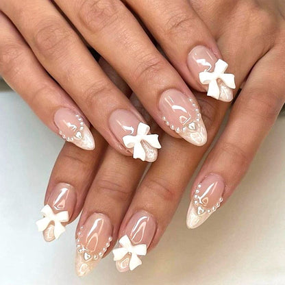 French White-Edged Nude Pink Almond Press-On Nails with Pearl Butterfly Bow