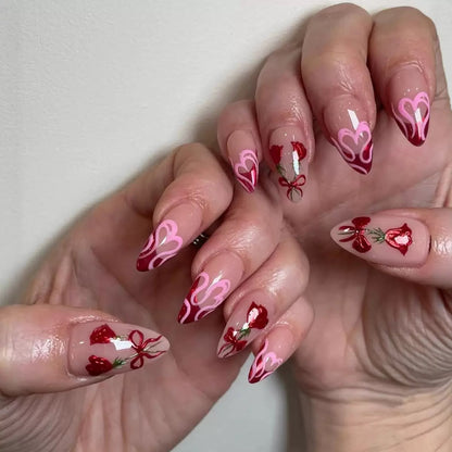 Valentine’s Day Soft Pink Base Almond Press-On Nails with Red French Tips, Bow, Rose Pink, and Heart Design