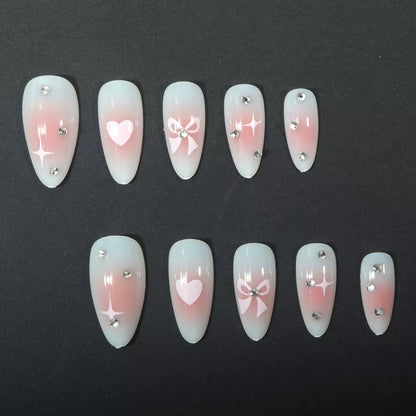 Valentine’s Day Simple Almond Press-On Nails with Heart, Bow, and Rhinestone Accents