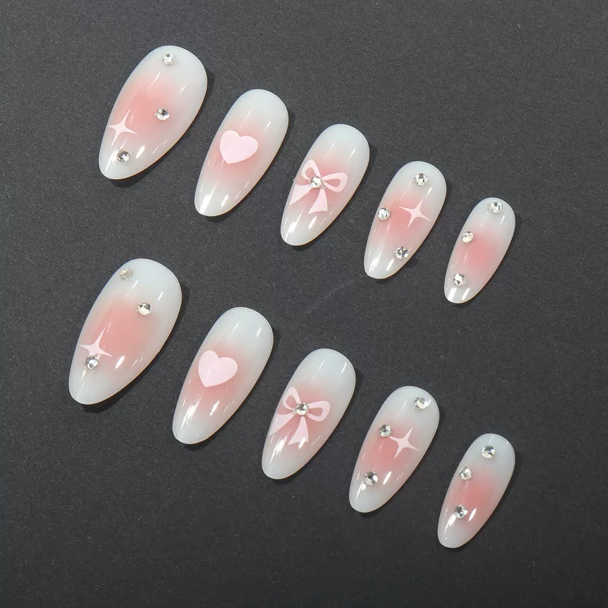 Valentine’s Day Simple Almond Press-On Nails with Heart, Bow, and Rhinestone Accents