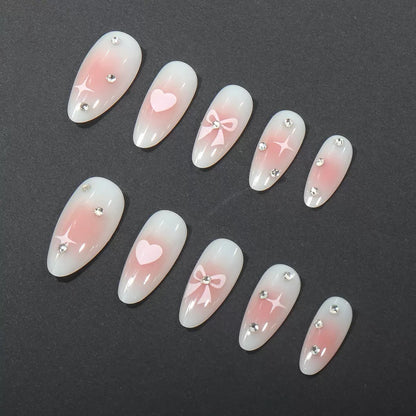 Valentine’s Day Simple Almond Press-On Nails with Heart, Bow, and Rhinestone Accents