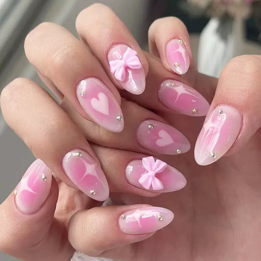 Valentine’s Day Almond-Shaped Blush Pink Press-On Nails with Fresh Bow Design