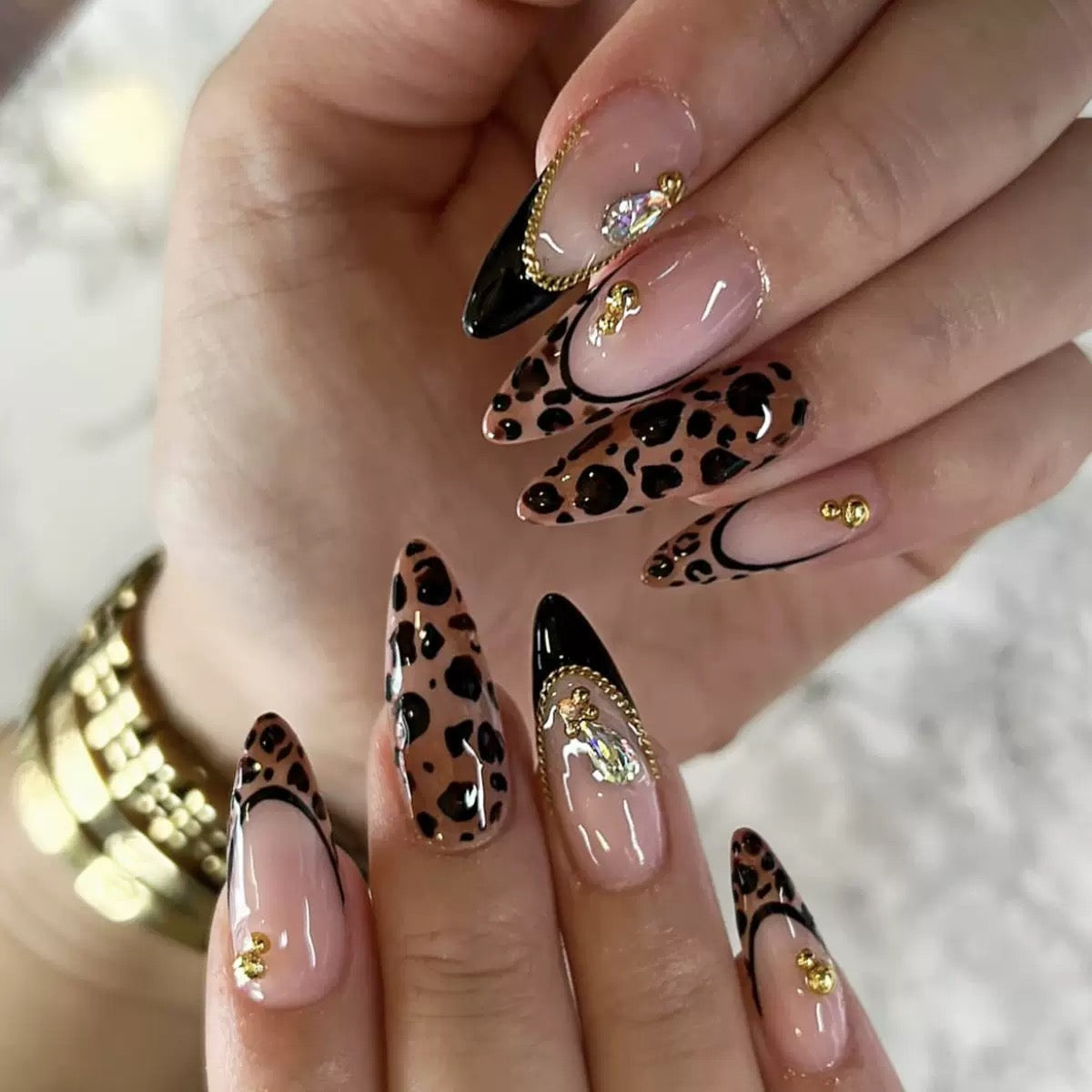 Black Leopard Print French-Edge Press-On Nails with Teardrop Rhinestones, Gold Chain & Metal Bead Accents